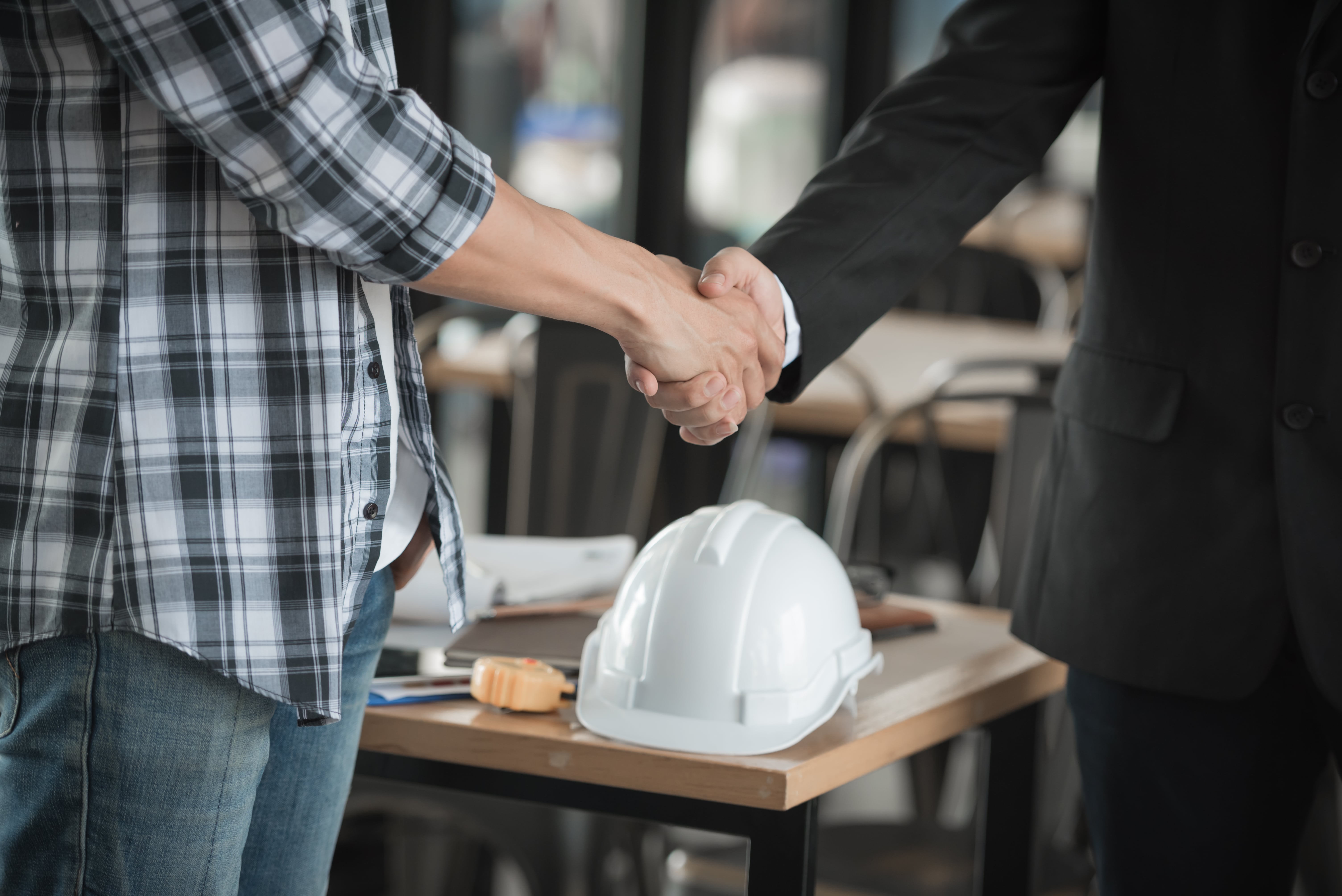 Close,Up,Of,Two,Businessman,Shake,Hands,Together,To,Make